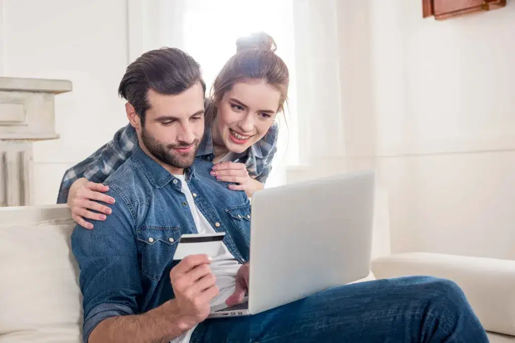 Young-Couple-Using-a-Laptop